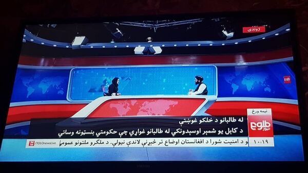 مصاحبه مجری زن در تلویزیون طلوع با یک تن از طالبان - اسپوتنیک افغانستان  