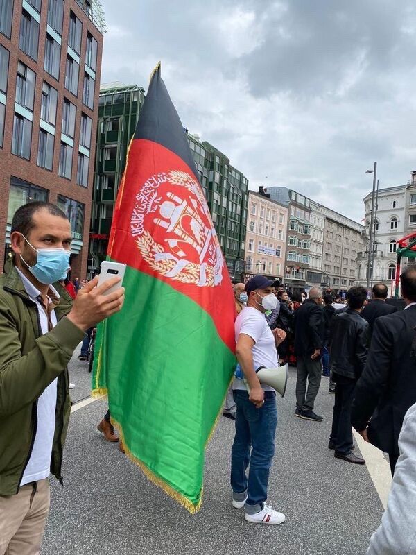 اعتراضات شهروندان افغان علیه طالبان و پاکستان در شهر هامبورگ آلمان - اسپوتنیک افغانستان  