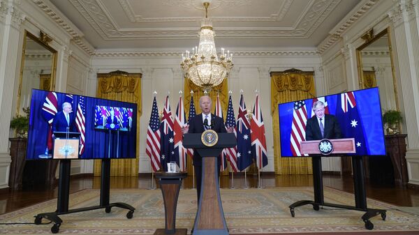 Президент Джо Байден, премьер-министр Австралии Скотт Моррисон и премьер-министр Великобритании Борис Джонсон на онлайн встрече по поводу новой инициативы США в области национальной безопасности в партнерстве с Австралией и Соединенным Королевством - اسپوتنیک افغانستان  