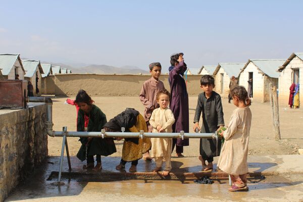 کودکان مهاجر هنگام بازی. - اسپوتنیک افغانستان  