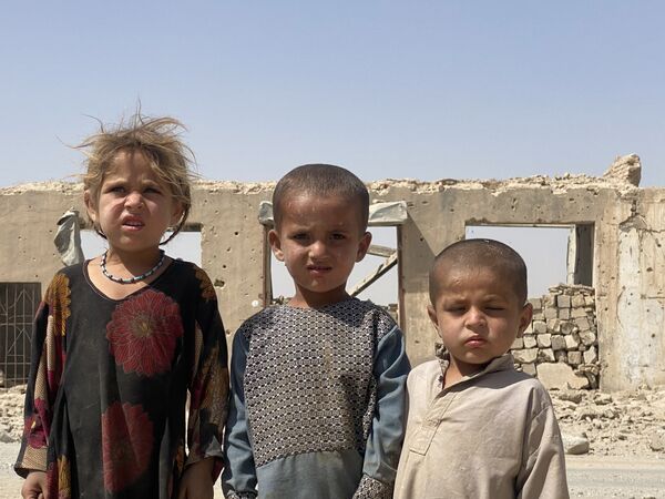 کودکان در ویرانه های هلمند. - اسپوتنیک افغانستان  