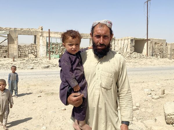 ساکنان محلی در خیابان های ویران هلمند. - اسپوتنیک افغانستان  