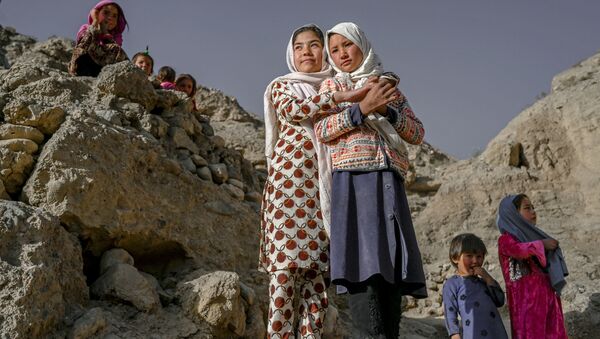 دهکده هزاره های غار نشین در بامیان.
 - اسپوتنیک افغانستان  
