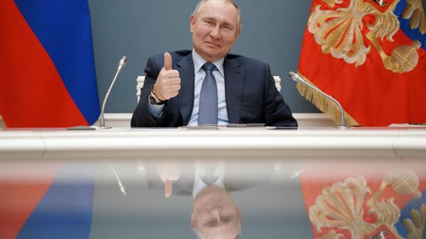 رئیس جمهور روسیه، در یک کنفرانس ویدئویی. - اسپوتنیک افغانستان  