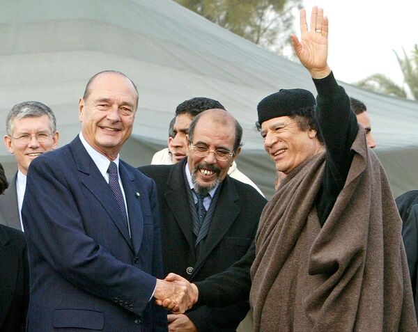 دیدار قذافی با رئیس جمهور فرانسه در سال 2004. - اسپوتنیک افغانستان  