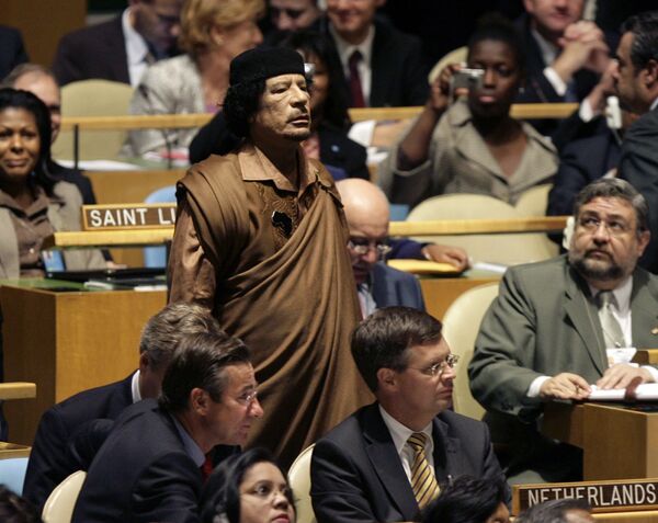 معمر قذافی رهبر لیبی در 64 مین اجلاس مجمع عمومی در مقر سازمان ملل متحد، سال 2009. - اسپوتنیک افغانستان  