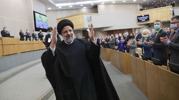 Президент Исламской Республики Иран Сейед Эбрахим Раиси после выступления на пленарном заседании Госдумы РФ - اسپوتنیک افغانستان  