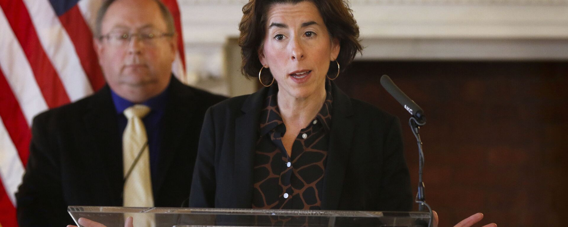 In this Sunday, March 22, 2020, file photo, Gov. Gina Raimondo gives an update on the coronavirus during a news conference, in Providence, R.I. Many states have yet to spend the federal funding they got to help with soaring costs related to the coronavirus crisis, making it tougher for states and cities to argue that they need hundreds of billions more from U.S. taxpayers. “If I knew today that another billion dollars was coming to Rhode Island to help solve our budget deficit, I’d spend the $1.25 billion now,” Raimondo said about the state's portion of money. “Lots of other governors are spending. They’re taking a gamble, and I’m just not ready to do that yet.” - اسپوتنیک افغانستان  , 1920, 10.03.2022