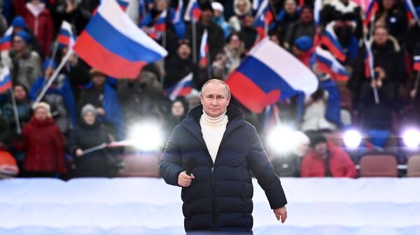 Президент РФ Владимир Путин выступает на митинге-концерте в Лужниках, посвященном воссоединению Крыма с Россией - اسپوتنیک افغانستان  