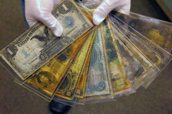 بقایای پولهای پیدا شده از کشتی تایتانیک. - اسپوتنیک افغانستان  