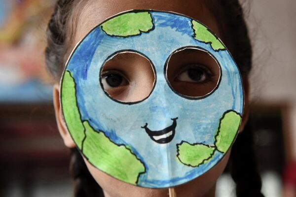تجلیل از روز جهانی زمین  در هند،/ روز جهانی زمین پاک یکی از رویداد مهم جهانی به شمار می‌رود. - اسپوتنیک افغانستان  