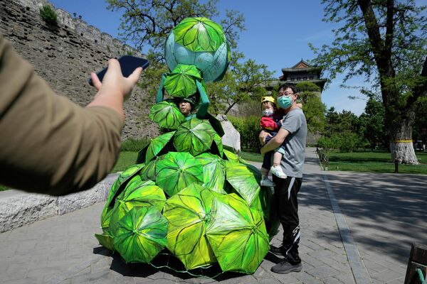 برگزاری روز زمین در چین/ روز جهانی زمین پاک یکی از رویداد مهم جهانی به شمار می‌رود. - اسپوتنیک افغانستان  