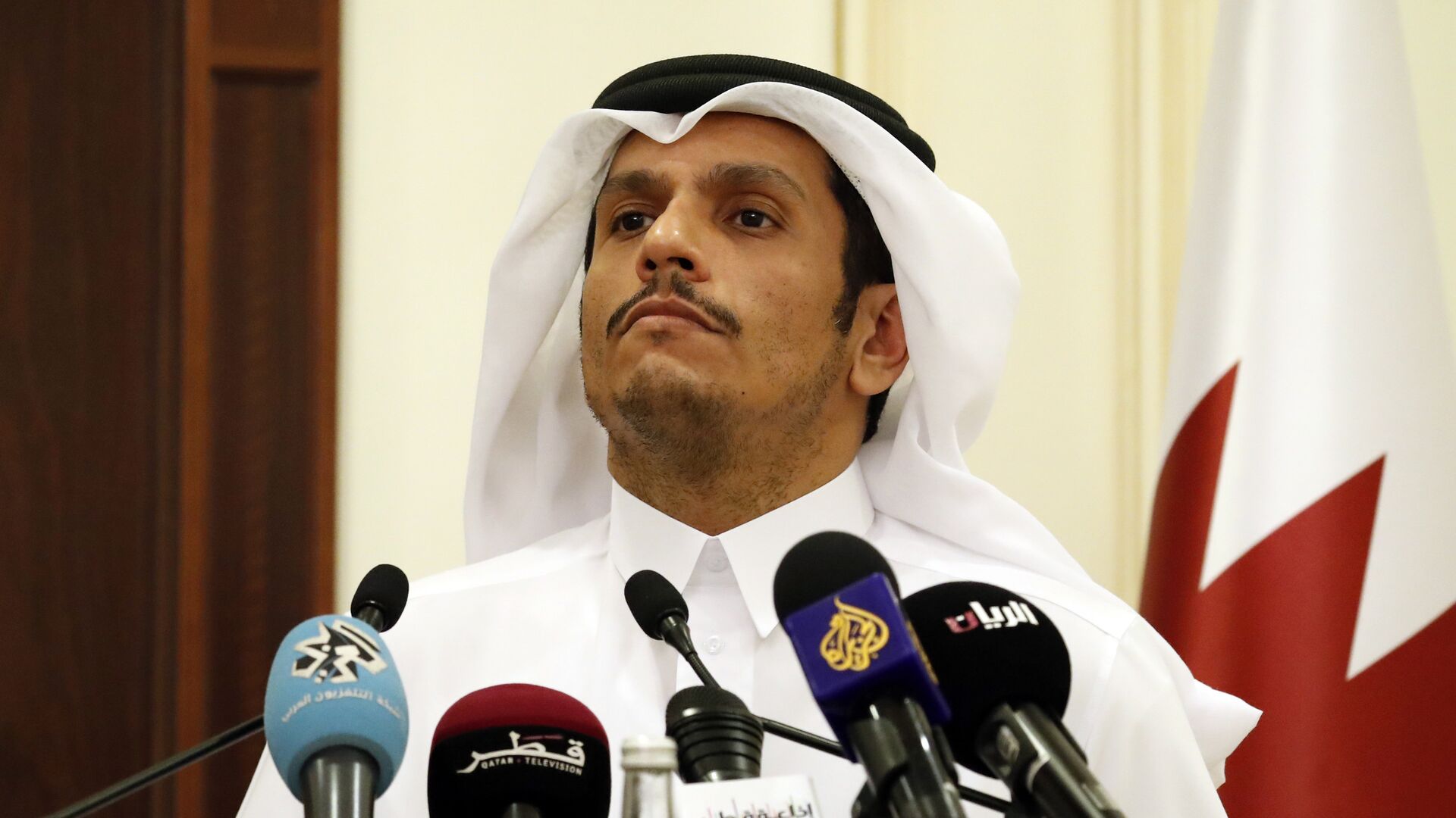 Sheikh Mohammed bin Abdulrahman Al Thani listens to a reporter's question during a media availability with Secretary of State Rex Tillerson, after their meeting, Sunday, Oct. 22, 2017, in Doha,Qatar - اسپوتنیک افغانستان  , 1920, 14.08.2022