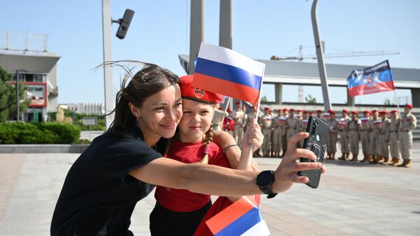 День Государственного флага России в ДНР - اسپوتنیک افغانستان  