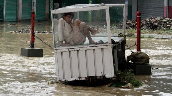 Затопленные улицы во время наводнения в Пакистане  - اسپوتنیک افغانستان  