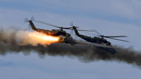 Вертолеты Ми-24 на стратегических командно-штабных учениях Восток-2022 на полигоне Сергеевский - اسپوتنیک افغانستان  