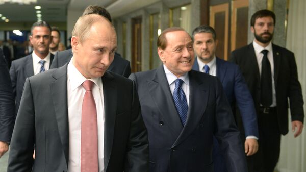 Президент России Владимир Путин и экс-премьер Италии Сильвио Берлускони во время встречи в Риме - اسپوتنیک افغانستان  