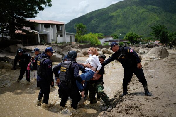 22 کشته و 52 مفقود در ونزوئلا بر اثر طغیان رودخانه‌ها پس از باران شدید. - اسپوتنیک افغانستان  