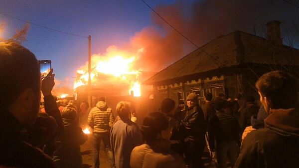 Пожар в частном доме, возникший в результате падения самолета Су-30 в Иркутске - اسپوتنیک افغانستان  