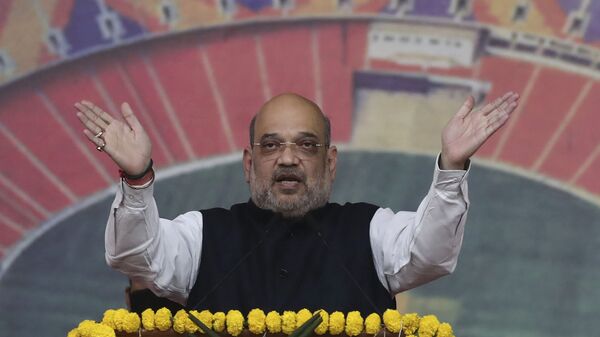 Indian Home Minister Amit Shah speaks during the inauguration of Narendra Modi Stadium in Ahmedabad, India, Wednesday, Feb. 24, 2021. The stadium was previously known as the Sardar Patel Gujarat Stadium. - اسپوتنیک افغانستان  