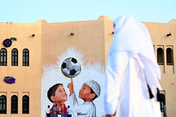 نقاشی دیوارها در جام جهانی فوتبال 2022 قطر - اسپوتنیک افغانستان  