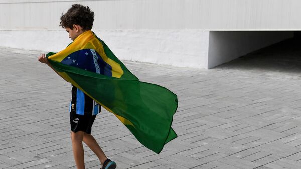 Юный бразильский болельщик в Олимпийском парке в Рио-де-Жанейро - اسپوتنیک افغانستان  