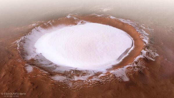 این تصویر از مریخ اکسپرس ESA دهانه کورولف را نشان می دهد، یک پدیده به طول 82 کیلومتر که در مناطق پست شمالی مریخ یافت می شود. - اسپوتنیک افغانستان  