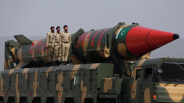 A Pakistani-made Shaheen-III missile, that is capable of carrying nuclear warheads, are displayed during a military parade to mark Pakistan National Day, in Islamabad, Pakistan, Wednesday, March 23, 2022. - اسپوتنیک افغانستان  