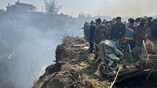 На месте крушения самолета Yeti Airlines в Непале  - اسپوتنیک افغانستان  