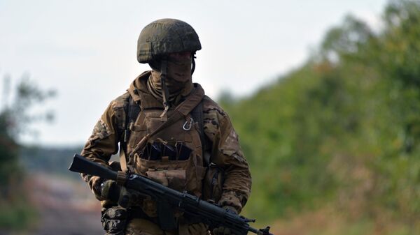 Боец ЧВК Вагнер на окраине Бахмута в Донецкой области - اسپوتنیک افغانستان  