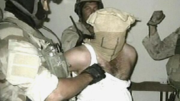 Издевательства над заключенными иракской тюрьмы Абу-Грейб в Багдаде, Ирак - اسپوتنیک افغانستان  