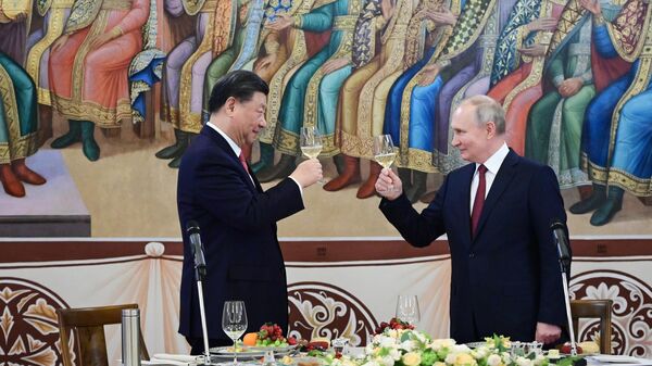 Президент РФ Владимир Путин и председатель КНР Си Цзиньпин на торжественном приеме в Грановитой палате Московского Кремля - اسپوتنیک افغانستان  
