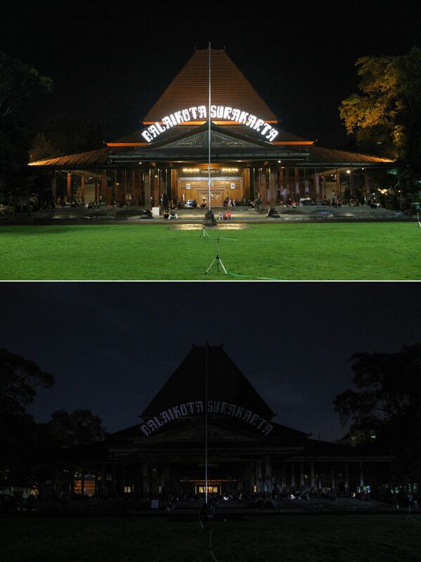 این ترکیبی از عکس‌ها نشان می‌دهد که تالار شهر قبل از (بالا) و بعد از (پایین) روشن شده است. چراغ‌ها به نشانه کمپاین محیطی ساعت زمین در Solo در 25 مارچ 2023 خاموش شده است. - اسپوتنیک افغانستان  