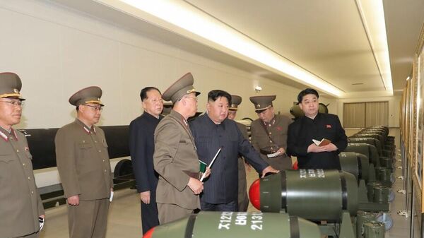 Лидер КНДР Ким Чен Ын на обсуждении проекта по созданию ядерного оружия - اسپوتنیک افغانستان  