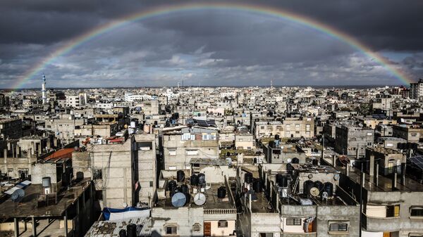 قوس قزح كبير يعلو مدينة رفح، قطاع غزة، فلسطين 10 فبراير 2020 - اسپوتنیک افغانستان  