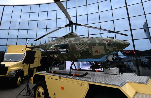 مجموعه طیاره های بدون سرنشین شناسایی و ضربتی &quot;شکارچی&quot; ساخت بلاروس در یازدهمین نمایشگاه بین المللی تسلیحات و تجهیزات نظامی MILEX-2023 در مینسک، پایتخت بلاروس. - اسپوتنیک افغانستان  