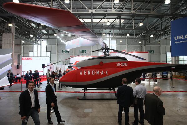 پهپاد هوایی از نوع هلیکوپتر Aeromax SH-3000 در نمایشگاه بین المللی صنعت هلیکوپتر HeliRussia 2023 در مرکز نمایشگاه بین المللی Crocus Expo. - اسپوتنیک افغانستان  