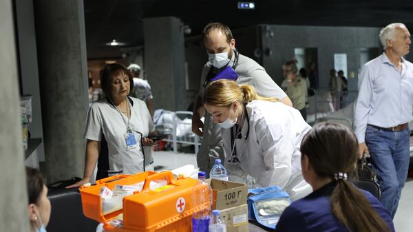 Медики в  пункте временного размещения жителей в Белгороде - اسپوتنیک افغانستان  