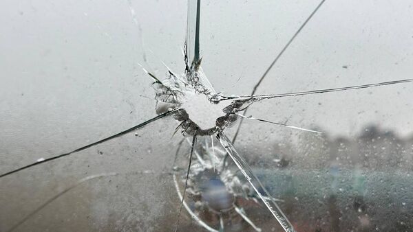 Разбитое стекло после обстрела со стороны ВСУ в Белгородской области - اسپوتنیک افغانستان  