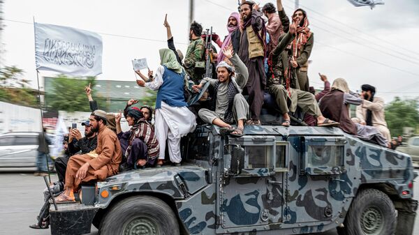 Боевики Талибана (движение Талибан находится под санкциями ООН за террористическую деятельность) праздную год прихода власти, Каблу, Афганистан - اسپوتنیک افغانستان  