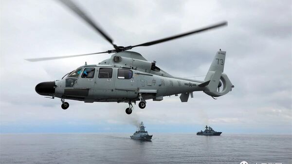 Вертолет и корабли ВМФ на совместных учениях России и Китая в Японском море - اسپوتنیک افغانستان  