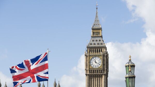Флаг Великобритании на фоне Вестминстерского дворца в Лондоне - اسپوتنیک افغانستان  