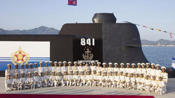 Церемония спуска новой подводной лодки КНДР с тактическими ядерными наступательными вооружениями - اسپوتنیک افغانستان  
