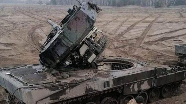 Leopard 2 tank damaged during training by Ukrainian forces in western Poland. - اسپوتنیک افغانستان  