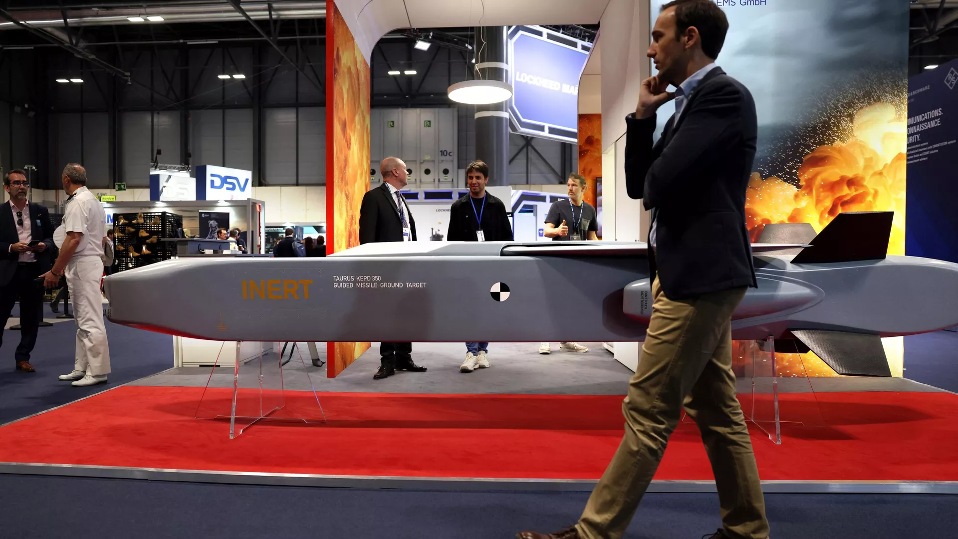 A visitor walks past a guide missile ground target KEPD 350 manufactured by the Swedish-German company Taurus at the International Defence and Security fair of Madrid, on May 17, 2023. 