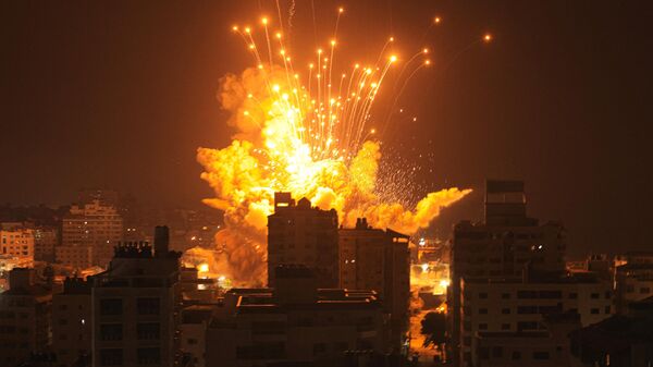Обстрел зданий в палестинском городе Газа - اسپوتنیک افغانستان  
