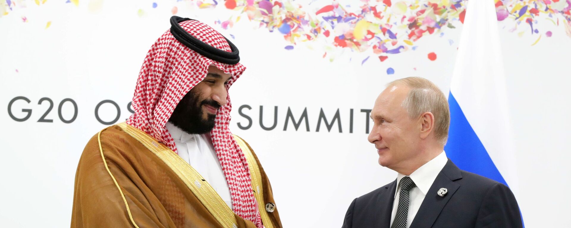 Президент России Владимир Путин и наследный принц Саудовской Аравии Мухаммед бен Сальман аль Сауд во время встречи на полях Группы двадцати в Осаке, Япония - اسپوتنیک افغانستان  , 1920, 14.10.2023