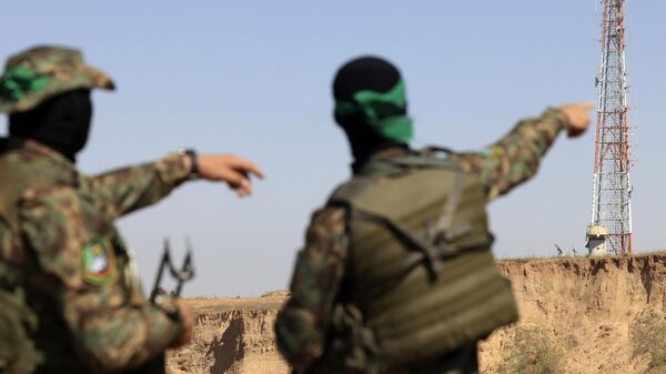Палестинские бойцы вооруженного крыла движения ХАМАС - اسپوتنیک افغانستان  
