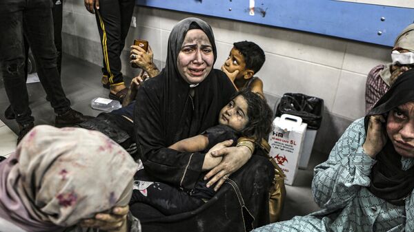 Раненые в больнице аль-Шифа после удара по больнице Аль-Ахли в Газе  - اسپوتنیک افغانستان  