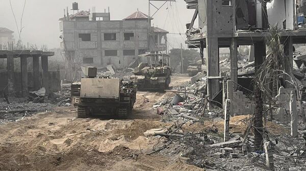 Израильские военные во наземной операции в секторе Газа - اسپوتنیک افغانستان  